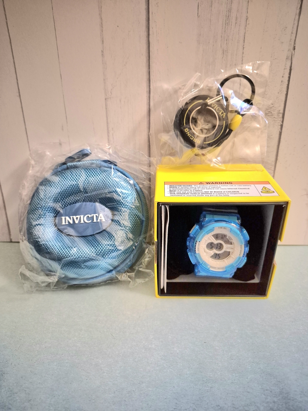 Invicta Blue and White Resin Sport Watch with Blue Carry Case